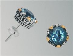 #306. Sterling silver stud earrings with 18K gold accents and blue topaz.                                                                                                                                                                                 