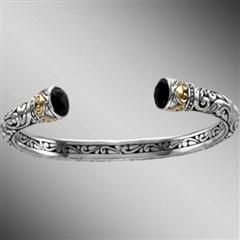 Open sterling silver bangle bracelet with onyx terminals.  Arista.                                                                                                                                                                                        