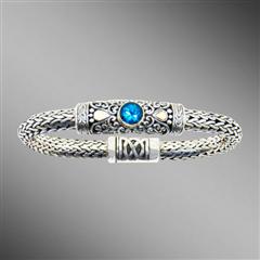 Woven silver bracelet with swiss blue topaz and magnetic clasp.  Arista.                                                                                                                                                                                  