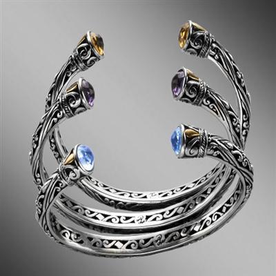 Set of silver open bangle bracelets with gemstone terminals.  Arista.                                                                                                                                                                                     