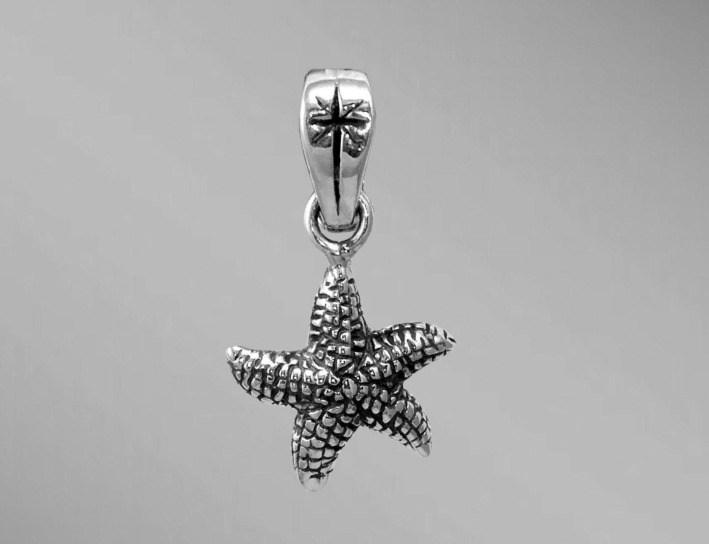 Starfish charm.  Silver starfish pendant.  Arista.                                                                                                                                                                                                        