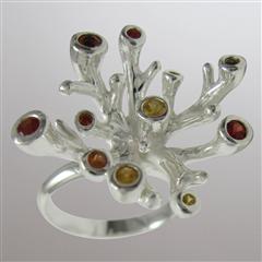 silver coral ring with fancy sapphires.                                                                                                                                                                                                                   
