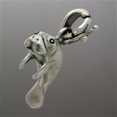 Silver manatee pendant charm.                                                                                                                                                                                                                             