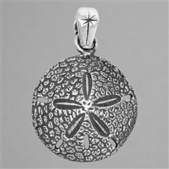 Silver sand dollar pendant.                                                                                                                                                                                                                               